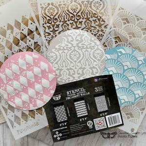 May include: A collection of decorative stencils with various patterns, including geometric and floral designs. The stencils are in different shapes and colors, with a package that reads "STENCIL DECADENT WALLS". The stencils are 6 x 9 inches.
