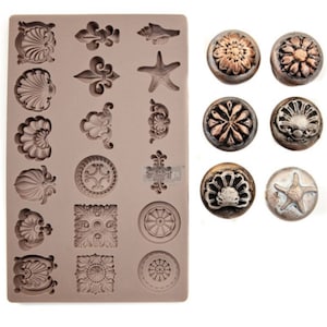 May include: A silicone mold with 18 different designs, including seashells, stars, and floral patterns. The mold is shown next to 9 finished resin pieces, each with a different design.