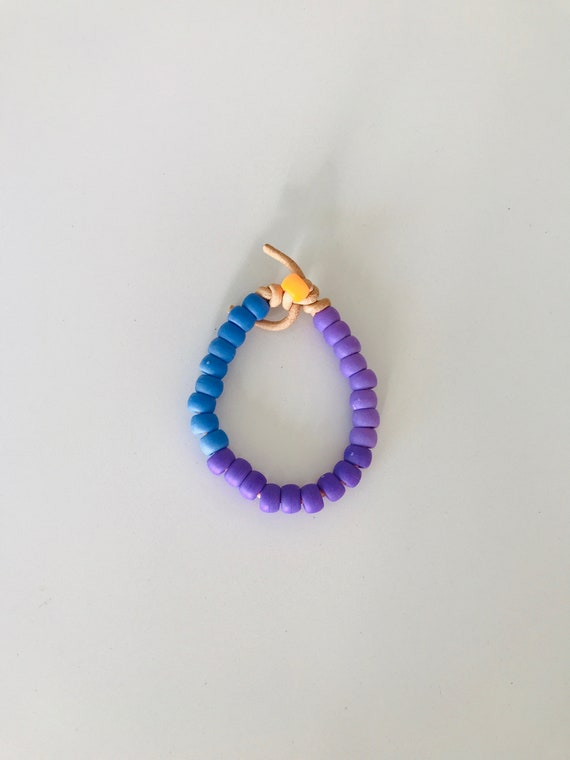 rave arm candy