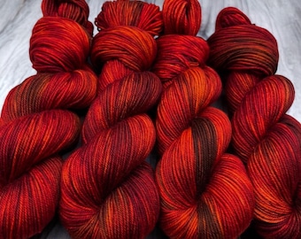 Rosewood Hand Dyed Yarn: Red, Orange, Brown Superwash Merino Wool