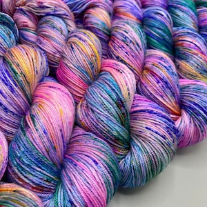 Monet washes of pastel colors speckled with spring flower colors hand dyed yarn available in any weight image 5