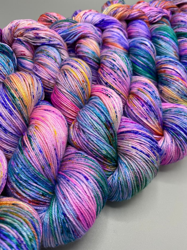 Monet washes of pastel colors speckled with spring flower colors hand dyed yarn available in any weight image 5