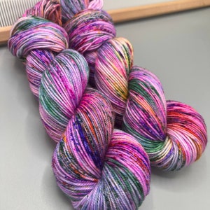 Monet washes of pastel colors speckled with spring flower colors hand dyed yarn available in any weight image 8