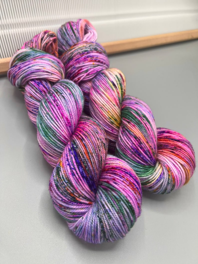 Monet washes of pastel colors speckled with spring flower colors hand dyed yarn available in any weight image 8