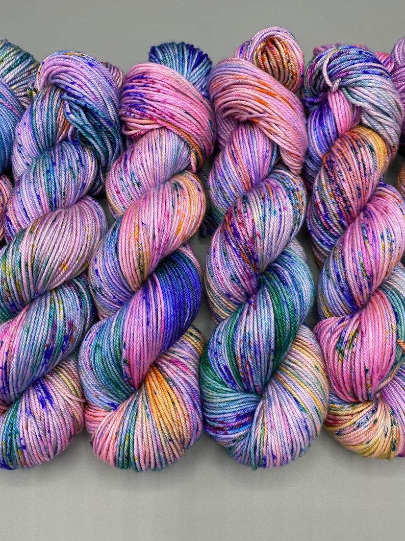 Monet washes of pastel colors speckled with spring flower colors hand dyed yarn available in any weight image 2