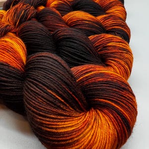Bourbon Hand Dyed Yarn: Smoky Brown, Orange, and Gold