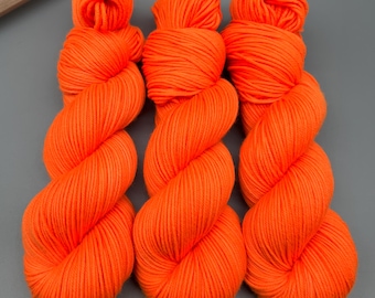 Neon Orange Hand-Dyed Superwash Merino Wool Yarn - UV Reactive