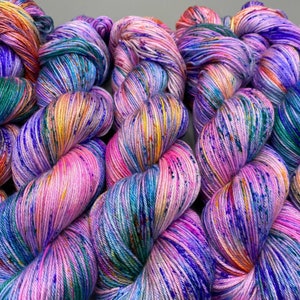 Monet washes of pastel colors speckled with spring flower colors hand dyed yarn available in any weight image 1