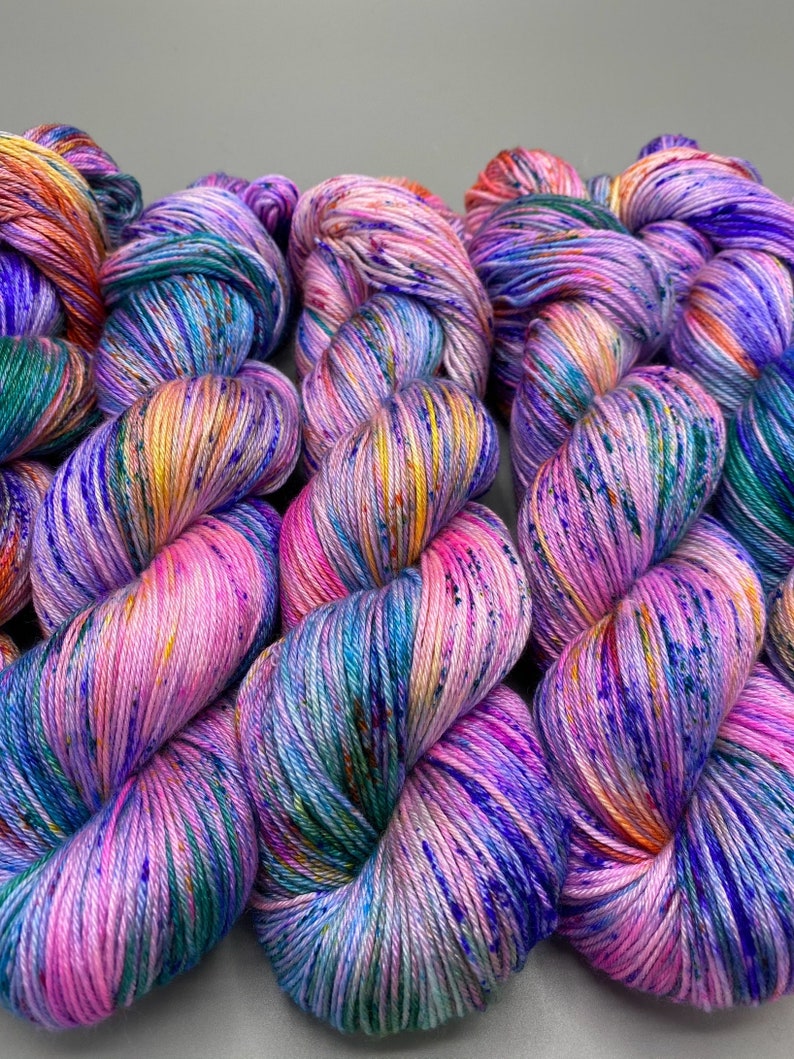 Monet washes of pastel colors speckled with spring flower colors hand dyed yarn available in any weight image 1