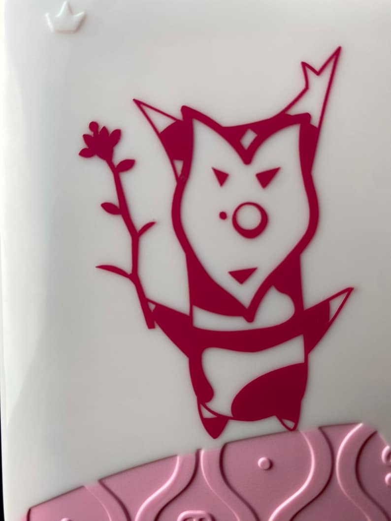 May include: A pink and white phone case with a pink cartoon character holding a flower. The character has a crown on its head and a large, round nose.