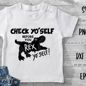 May include: White t-shirt with a black dinosaur graphic and the text "Check Yo'self Before You Rex Yo'self!"