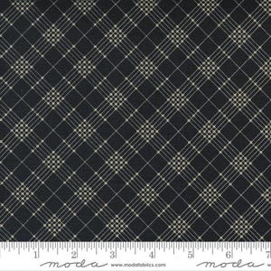 May include: Dark navy fabric with a plaid pattern in a light beige color. The plaid design features intersecting lines and small dots, creating a grid-like appearance. The fabric is suitable for various sewing projects.