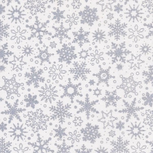 May include: White fabric with a repeating pattern of silver glitter snowflakes in various sizes. The snowflakes have detailed designs and are scattered across the surface, creating a wintery theme.