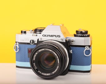 Olympus OM-1N SLR Film Camera F.zuiko Auto-s 50mm F/1.8 Lens Navy