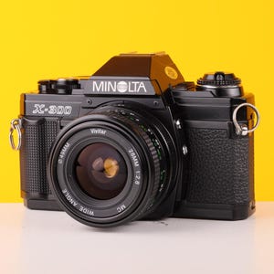 Minolta X-300 35mm Film Camera with Vivitar 28mm f/2.8 MC Wide Angle Lens