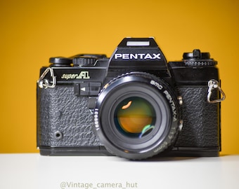 Cámara de película Pentax Super A de 35 mm con lente SMC Pentax A de 50 mm f/1.7