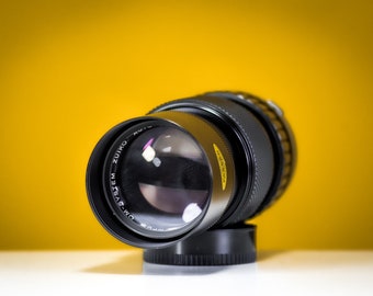 Olympus Zuiko 75-150 mm f/4 Auto-Zoom Tele-Objektiv mit 49 mm Skylight Filter und Leder Hartschale