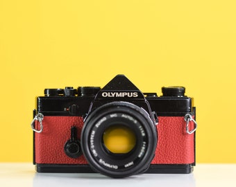 Olympus OM1 MD 35mm Film Camera with Zuiko 50mm f/1.8 Prime Lens With New Red Leather Skin