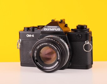 オリンパス OM40 プログラムフィルムカメラ（50mmレンズ付き） - Etsy 日本