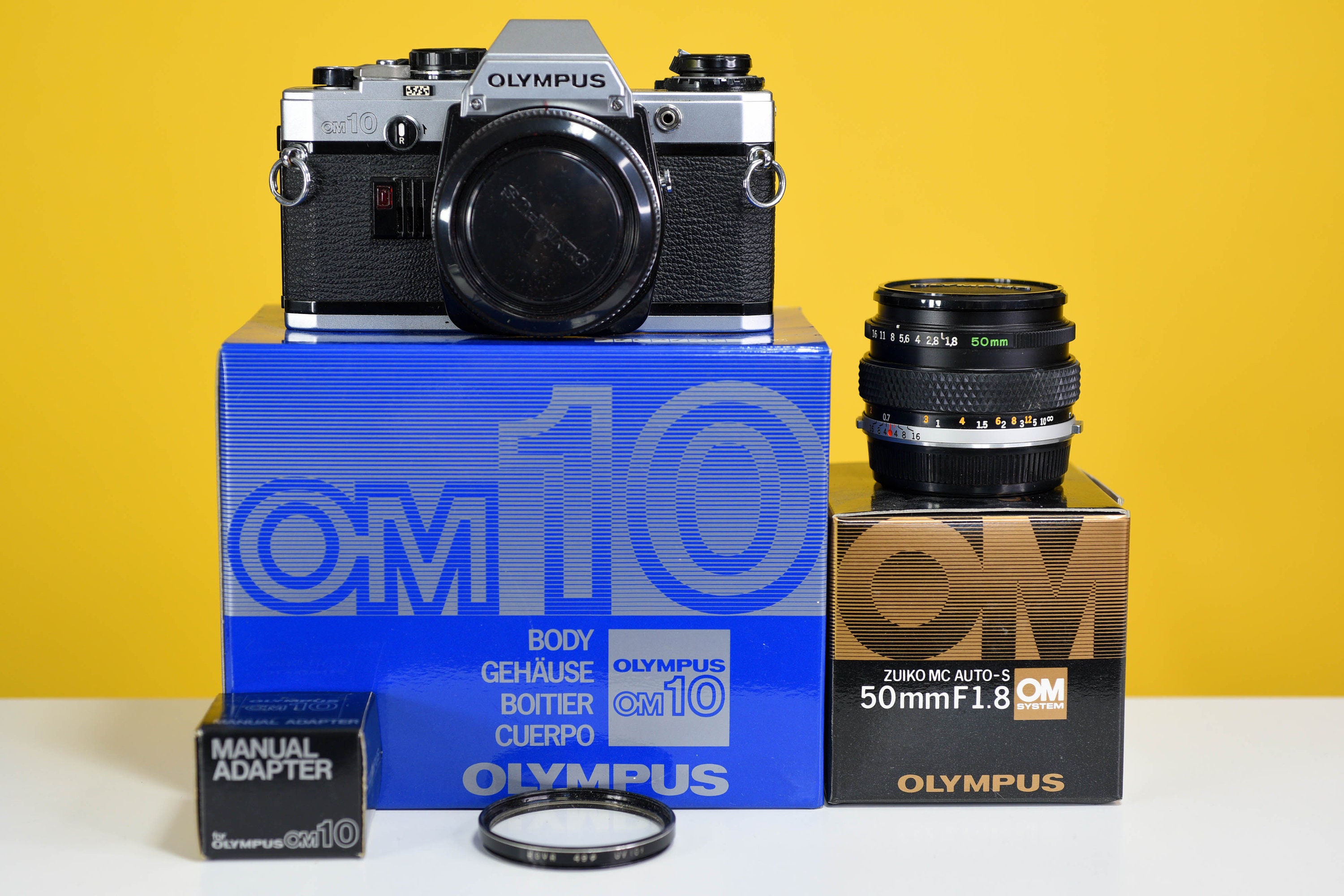 OLYMPUS OM10 （マニュアルアダプター付き） + 50mm f1.4 OLYMPUS OM10 マニュアルアダプター付 レンズカビアリ ￥15,000