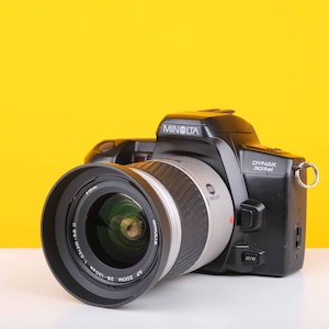 Minolta Dynax 303si with Minolta AF Zoom 28-100mm f3.5 - 5.6 D Lens