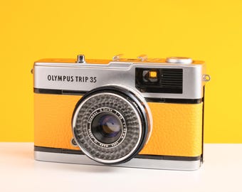 Olympus Trip 35 Vintage Filmkamera mit Zuiko 40 mm f2,8 Objektiv mit Neuer Gelber Lederhaut