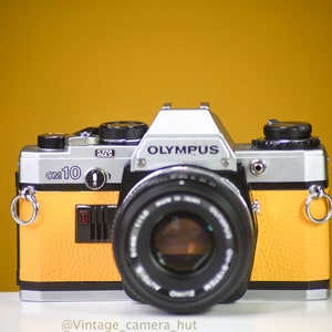 Olympus OM10 Vintage Film Camera with 50mm f/1.8 Lens With New Leather Skin