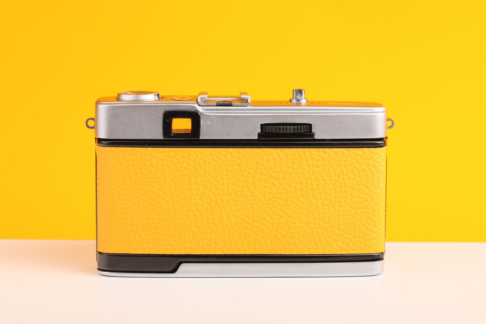 Olympus Trip 35 Filmkamera – Mit Zuiko 40mm F2,8 Objektiv, Gelbes Leder, Revidiert (serviced)