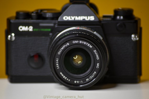 Olympus OM2 SPOT/PROGRAM 35mm Film Camera With Zuiko Auto W Olympus OM2 SPOT/PROGRAM 35mm Film Camera With Zuiko Auto W