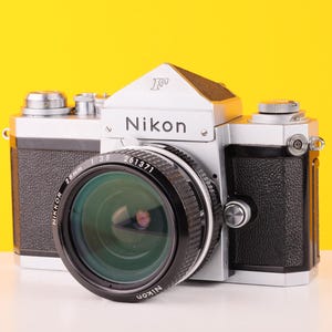 Nikon F 35mm Film Camera with Nikkor 28mm f/2.8 Lens with Prism Finder Head