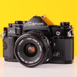 Canon A-1 Vintage 35mm Film Camera with Canon FD 28mm f/2.8 Lens