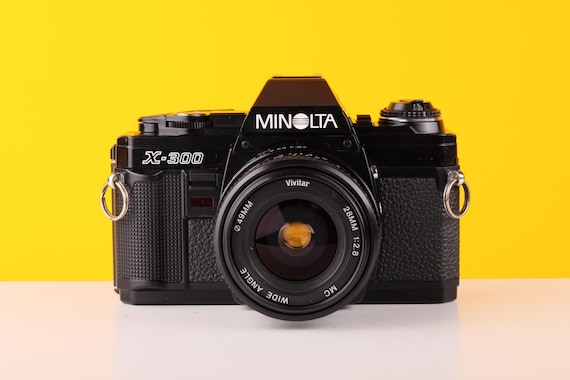 Appareil argentique Minolta X300 + objectif 50mm 1:2 - Excellent état - Photo, audio & vidéo Appareil argentique Minolta X300 + objectif 50mm 1:2 - Excellent état - Photo, audio & vidéo