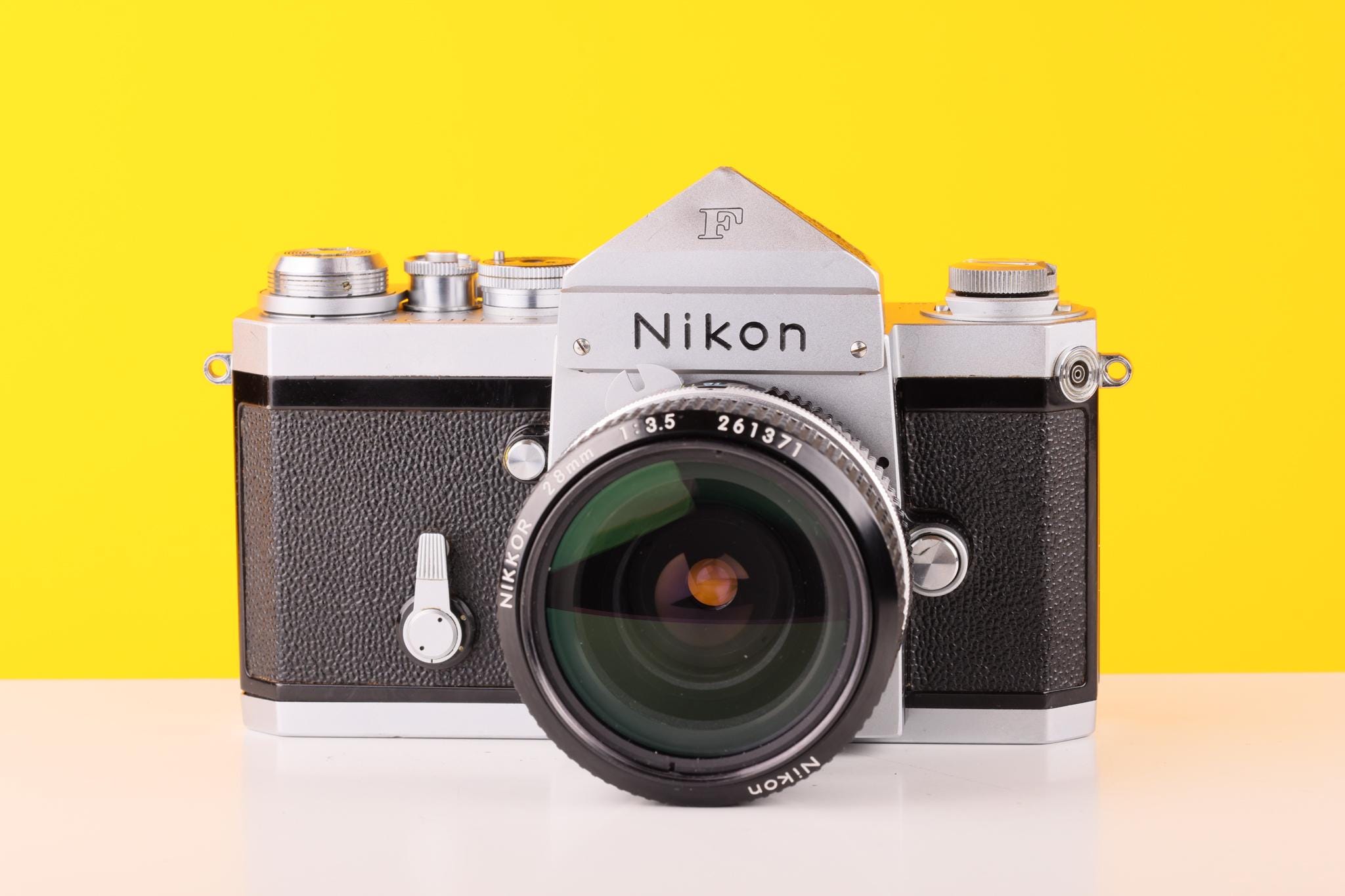 Nikon F 35mm Film Camera With Nikkor 28mm F/2.8 Lens With Prism
