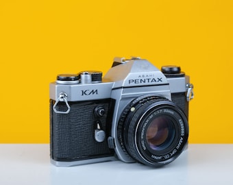 Pentax KM Silver 35mm SLR Film Camera Body + SMC 55mm F/1.8 Lens
