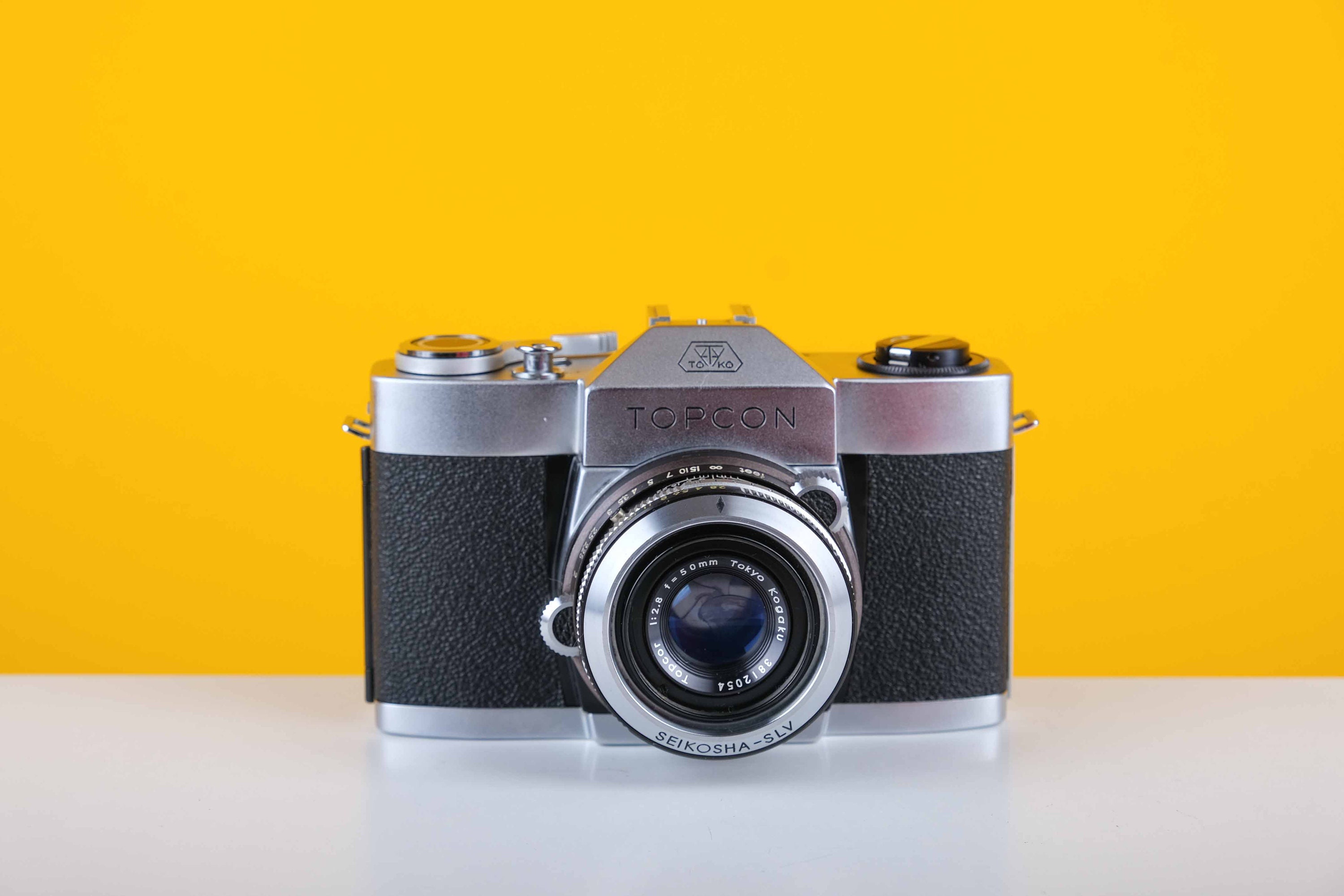 人気海外ブランドアイテム｜ファッション通販 Topcon R 35mm Film Camera With Seikosha-slv 50mm F2.8 Lens フィルムカメラ
