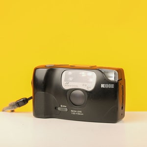 Ricoh FF-9s comes with a 35mm f3.5 lens