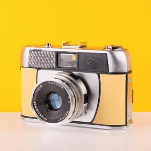Halina Paullette Electric 35mm Rangefinder Camera with Halinar 45mm f2.8 Lens