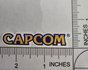 CAPCOM 80s 90s Retro Gaming Vinyl Sticker Decal Logo 2.5"x0.5"
