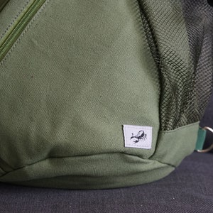 Green Canvas Sling Bag Crossbody Travel Backpack with Anti Theft Pocket One Strap Tablet Backpack Chest Bag with Bottle Holder image 6