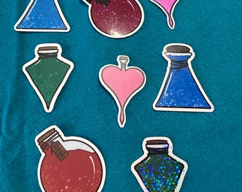 May include: Set of eight stickers featuring various potion bottles and hearts. The stickers are printed on a clear background and have a glitter finish. The bottles are filled with different colored liquids, including blue, green, red, and pink. The hearts are pink and have a glitter finish.