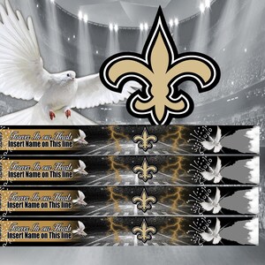 May include: Four black and gold ribbon banners with a white dove and the text "Forever In our Hearts Insert Name on This line" and the New Orleans Saints logo. The background is a black and white image of a stadium.