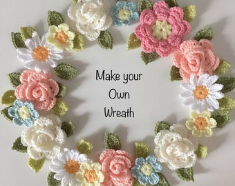 Crochet flowers and leaves for wreath making.