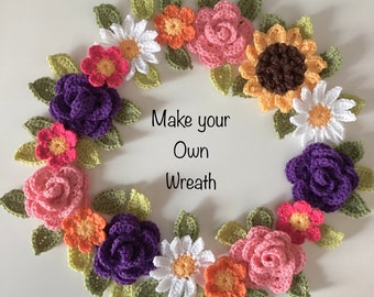 Crochet flowers and leaves for wreath making.