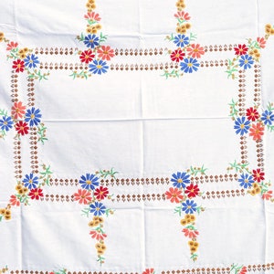 Tablecloth hand-embroidered with colorful flowers