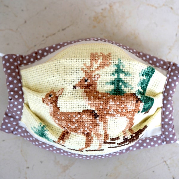 Everyday mask mouthguard with hand-embroidered deer