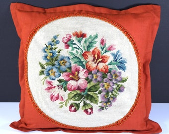 Vintage tapestry roses on rust red cushion for the cozy home