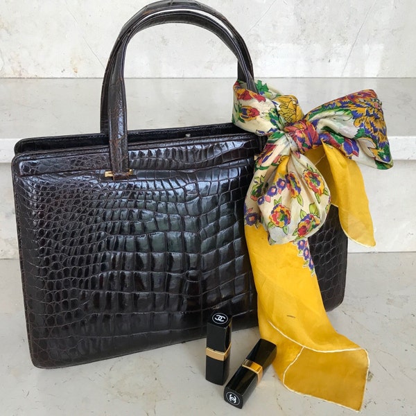 large vintage handbag in dark brown crocodile look