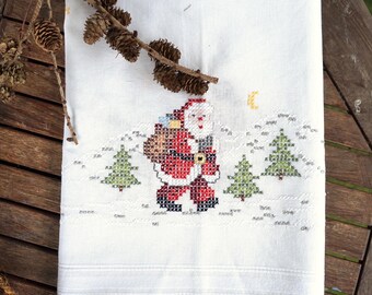 Christmas tablecloth hand-embroidered with Santa Claus in cross stitch