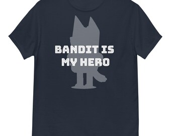 May include: A navy blue t-shirt with a gray silhouette of a dog and the text "Bandit is my hero" in white.