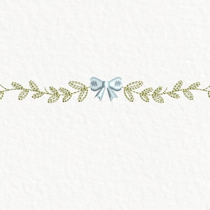 May include: A horizontal embroidery design featuring a central light blue bow flanked by symmetrical olive green leafy branches. The text 100% Human Made appears in the top right, and the text Embroidarlings by RivusDea is in the bottom right.